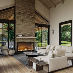 a living room with a fire place and couches