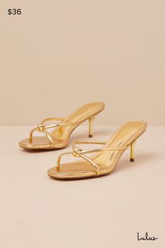 The Lulus Victoire Gold Knotted Strappy High Heel Slide Sandals are here to complete all your simply stunning date night looks! These strut-worthy sandals have a shiny faux leather construction that shapes an open-toe upper and an almond-shaped footbed. Crisscrossing straps boast a knotted detail atop the slide-on silhouette that sits atop a flirty stiletto heel. 2. 75" wrapped stiletto heel. Cushioned insole. Rubber sole has nonskid markings. Man made materials. Imported. Lulus | Victoire Gold Gold Tie Up Heels, Heels Classy Low, Gold Heels Outfit, Vacation Heels, Hoco Heels, Bridesmaid Shoe, Graduation Heels, Vacay Fits, Gold Kitten Heels