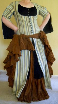 a woman wearing a dress made out of fabric