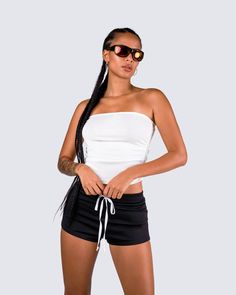 No one ever said a simple and cozy look can't be a whole moment 😏 Lay back, and relax in this 2 piece set featuring a white jersey tube top and a pair of black shorts. The comfort and "BUNDA" graphic really are what make this fit 💅 Casual Tube Top For Workout, Stretch Tube Top For Sports In Summer, Trendy Workout Tops With Built-in Shorts, Casual Crop Top With Built-in Shorts For Sports, Casual Summer Tube Top For Workout, Casual Tube Top For Summer Workout, Sporty Stretch Tube Top For Sports, Sporty Short Tops For Streetwear, Sporty Short Length Tops For Streetwear