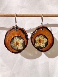 925 silver hooks with preserved strawberry flowers in apricot wooden frames. Epoxy resin is used to ensure the wood and flowers will stay in their natural form and you can wear and cherish them forever. They are elegant and bohemian at the same time, and very lightweight. Every item is one of a kind and can't be made again, making the creations not only unique but one of a kind as well.  Embrace the Beauty of Nature, Wear It Forever. Strawberry Flowers, Earring Frame, Strawberry Flower, Natural Form, Botanical Jewelry, Wooden Earrings, Jewelry Silver, Real Flowers, Epoxy Resin