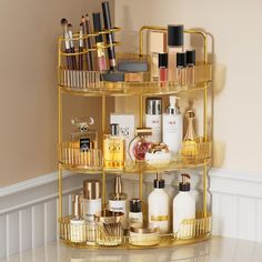 a bathroom shelf filled with lots of cosmetics and perfume bottles on top of it's sides