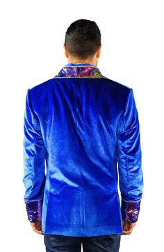 This mens royal blue velvet smoking jacket exudes a certain sophistication that other jackets can only dream of. We have taken this perfectly tailored,double breasted blazer to the next level with the addition of iridescent multi color flip sequins. FEATURES: Double breasted Fully lined with our signature satin 4 pockets including 1 inside breast pocket Reversible iridescent sequin contrast collar, cuffs and trim Velvet trimmed collar to for ultimate comfort Ethically made in-house in our studio Royal Fitted Blazer For Party, Velvet Tuxedo Style Long Sleeve Outerwear, Winter Party Blue Blazer, Velvet Long Sleeve Tuxedo Style Outerwear, Blue Party Outerwear With Lapel Collar, Royal Blue Party Blazer, Royal Fitted Fall Outerwear, Blue Velvet Winter Outerwear, Royal Fitted Outerwear For Winter