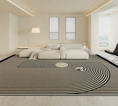 a living room filled with furniture and a spiral rug