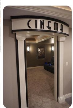 the entrance to a movie theater is decorated with black and white letters that read'cinema '