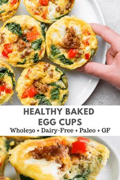 healthy baked egg cups with spinach, tomatoes and sausage in them on a white plate