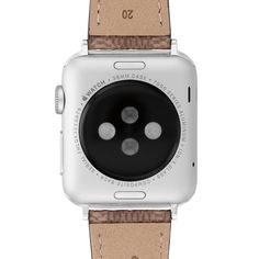 From Coach, this ladies' replacement band for smart watches is a versatile choice when she wants to change-up her look. Embellished with Coach's signature "C's" logo, the 20.0mm-wide tan canvas strap secures with a buckle clasp. Easily interchangeable, this style is made exclusively for use with the 38.0mm and 40.0mm Apple Watch®. Apple Watch® is a trademark of Apple, Inc. We are an authorized Coach dealer. Silver Leather Watch Band With Rectangular Dial, Silver Leather Watch Accessories With Date Display, Adjustable Silver Watch Bands With Palladium Hardware, Modern Silver Watch Band With Leather Strap, Classic White Gold Bracelet Strap Watch Accessories, Classic White Gold Watch With Bracelet Strap, Silver Watch Accessories With Leather Strap, Classic Formal Apple Watch Band With Bracelet Strap, Classic Formal Apple Watch Bracelet Strap