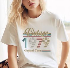 "45th Birthday Shirt,Vintage 1979 Shirt,45th Birthday Gift For Women,45th Birthday Gift For Men,45th Birthday Best Friend,45th BirthdayWoman# Please Check All Photos For Details.   🐞Choose Your T-Shirt Size From The Drop-Down Lists Next To The item Picture   ⭐Choose Of Your T-Shirt Color From The 2nd Picture   🐞Use \"Add message to Seller\" link On The Checkout Page To Send me the Following important Details For Your Order's Customization.   ⭐Shipping Time Varies by location (we are located in Sugar Land, Texas) please consider that our turn around time is 1 to 3 business days.     ⭐Which brand do you use for t-shirts? We use Gildan Softstyle, Bella Canvas Unisex, Hanes, Outlash, Tees,  District and Next Level when we have a shortage of stocks for certain colors and sizes. Our printing m 29th Birthday Gifts, Birthday Best Friend, 25th Birthday Gifts, 34th Birthday, 33rd Birthday, Birthday Gift For Women, Sugar Land, Best Friend Birthday, Birthday Woman