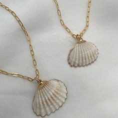 This stunner is simple, bold, and unique. Wear a little bit of the beach all year long. So fun to wear alone or create even bolder looks by layering with other pieces. Here's another thing we love about our She Sells Seashells Necklace, remove the shell charm and wear this fabulous thick paper clip link chain alone or create different layered looks. natural electroplated shell with gold or silver accent 14kt gold fill or sterling silver paper clip chain shell colors can vary Silver Shell Necklace For Vacation, Silver Shell Necklace For Summer Vacation, Elegant Shell Jewelry For Beach Season, Elegant Silver Jewelry For Beach Season, Silver Shell With Ocean-inspired Style For Vacation, Silver Ocean-inspired Shell For Vacation, Silver Strand Shell Necklace For Beach, Summer Shell Jewelry For Gifts, White Everyday Jewelry For Beach Season