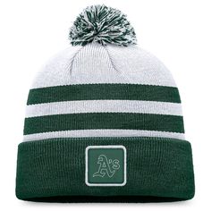 a green and white striped beanie hat