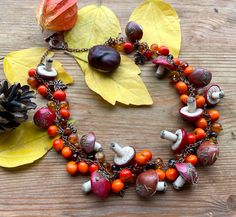 Mushroom Forest necklace with rowan berries, cornelian, tiger eye stones. Fall Autumn color jewelry with mushrooms. Woodland witch necklace. Pogan jewelry for fall forest lover. Vegetarian jewelry gift. Autumn inspired necklace Its mushroom season! Do you like to pick mushrooms in the fall? I love it very much! I adore the smell of forest and mushrooms! And I really miss our Carpathian mountains .. I could not be there this year. But I hope next year I will be able to visit these wonderful place Rowan Berry Necklace, Brown Mushroom Necklace, Handmade Multicolor Jewelry For Fall, Handmade Bohemian Jewelry For Fall, Vegan Witch, Woodland Witch, Rowan Berries, Forest Necklace, Autumn Jewelry