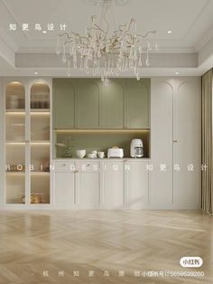 an empty kitchen with white cabinets and chandelier hanging from the ceiling above it