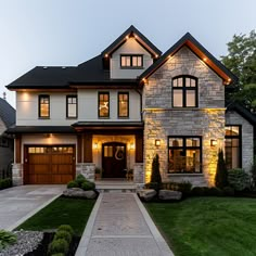 a house with lights on the front and side of it