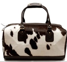 Introducing the exquisite Cowhide Leather Duffle Bag - KDL-08 by Celestial Leather London! Crafted in London, this timeless masterpiece combines style and durability.