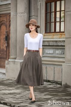 "DETAIL * 50% linen, 50% cotton * Two side pockets * Back Elastic waist * Below knee length * A linen skirt * Plus size skirt * Perfect for summer, spring * Wash by hand or machine with cold water * The model is 170cm (5′ 7″) tall with a 80cm (31.5\") bust, 66cm (26\") waist. She is wearing a XS in red. * Choose CUSTOM Order if you Can't find your size in our size Chart Chang the Length Your Height is not Between 5'1\" - 5\"9\" Your weight is not Between 47 kg - 75 kg SIZE GUIDE Size vary betwee Cotton Pleated Skirt With Pockets And Relaxed Fit, Cotton Pleated Skirt With Pockets, Knee-length Linen Skirt For Work, Casual Linen Skirt For Fall, Beige Pleated Skirt With Pockets For Work, Casual Full Pleated Skirt With Pockets, Casual Beige Pleated Skirt With Pockets, Beige Casual Pleated Skirt With Pockets, Fall Cotton Pleated Skirt With Pockets