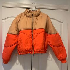 Free People Movement Puffer Jacket Size Small. Never Worn. Excellent Condition. Fall Sporty Puffer Windbreaker, Sporty Puffer Outerwear For Fall, Winter Nylon Cropped Jacket With Long Sleeves, Sporty Puffer Outerwear With Long Sleeves, Spring Puffer Windbreaker With Long Sleeves, Spring Sporty Windbreaker For Cold Weather, Spring Long Sleeve Puffer Windbreaker, Sporty Spring Windbreaker For Cold Weather, Casual Orange Nylon Outerwear