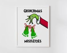 a poster with the words grinmas mistletes on it and two hands holding green gloves