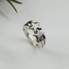 Shooting Star Ring in Sterling Silver: features two high polished shooting stars with tails, meeting in the middle. The original idea for this ring was for it to be a symbol of fate and "stars aligning". Oxidized to enhance details. (The ring shown is a size 6) Due to the handmade nature of our items, please allow 2-3 weeks for production. Star Rings, House Items, Funky Jewelry, Star Jewelry, Shooting Star, Star Ring, Shooting Stars, Jewelry Inspo, Dream Jewelry