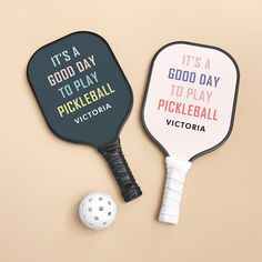 two paddles that say it's a good day to play pickleball and victoria