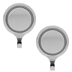 two round mirrors are shown side by side on a white background, one is empty and the other has no reflection