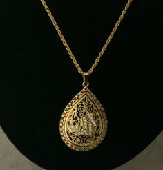 Beautiful gold chain and elegant ALLAH'S pendent and amazing multi stone handwork perfect Islamic jewelry lovers. Gold Plated Costume Jewelry Necklaces For Gifts, Ornate Jeweled Pendant Jewelry, Jeweled Teardrop Necklace As Gift, Teardrop Jeweled Necklace Gift, Gold Plated Gemstone Chain Necklace Gift, Gold-plated Teardrop Pendant Jewelry, Gift Jeweled Teardrop Pendant Necklace, Gift Teardrop Pendant Necklace With Jewels, Costume Jewelry Pendant Necklace For Gift