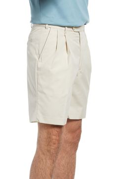 Crisp pleats refine the look of these versatile shorts made from soft, lightweight poplin. 9" inseam; 24" leg opening; 11 3/4" front rise Zip fly with button closure Front slant pockets; back button-welt pockets 65% polyester, 35% cotton Machine wash, tumble dry Imported Men's Clothing Classic Shorts With Welt Pockets For Spring, Classic Bottoms With Elastic Waistband And Short Inseam, Classic Bottoms With Elastic Waistband And Short Length, Classic Shorts With Belt Loops, Classic Summer Bottoms With Pleated Waist, Solid Cotton Bottoms With Pleated Waist, Classic Pleated Shorts, Classic Bermuda Shorts With Short Inseam For Summer, Classic Bermuda Shorts With Welt Pockets