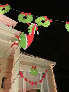 christmas decorations on the outside of a house