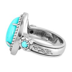 This beautiful ring features one large 10x15 mm teardrop-shaped genuine Kingman Turquoise and is flanked by 2 additional smaller round Kingman Turquoise gemstones. All are prong-set in nickel-free .925 Sterling Silver with rope border detailing, concha flower and fan designs and an oxidized, polished finish. Kingman Turquoise is prized for its rich blue hues and distinctive black or brown matrix, sourced from the Kingman Mine in Arizona, one of the oldest and most productive Turquoise mines in t Round Turquoise Ring With Gemstone Accents, Oval Turquoise Ring With Polished Finish, Turquoise Ring With Bezel Setting For Anniversary, Elegant Turquoise Teardrop Rings, Anniversary Turquoise Ring With Bezel Setting, Blue Cabochon Teardrop Ring, Blue Teardrop Cabochon Rings, Blue Turquoise Teardrop Ring For Anniversary, Blue Teardrop Turquoise Anniversary Ring