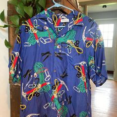 Vintage Patagonia Chouinard Hawaiian Shirt. Mens Small, Great Condition For A 40 Year Old Shirt. Circa Early 80’s. Made In Hong Kong, 100% Rayon. Purchased 11-12 Years Ago, Never Worn By Me. Blue Graphic Print Shirt With Spread Collar, Blue Spread Collar Shirt With Graphic Print, Blue Shirt With Graphic Print And Spread Collar, Casual Blue Patagonia Top, Patagonia Short Sleeve Tops For Summer, Patagonia Summer Tops With Short Sleeves, Patagonia Shirts, Vintage Patagonia, Old Shirts