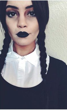 a woman with black lips and fake mustaches on her face