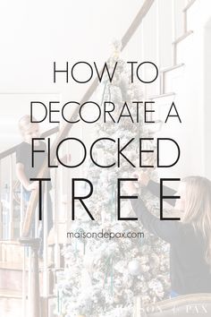 two people decorating a flocked tree with the words how to decorate a flocked tree