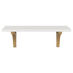 a white table with gold legs against a white background