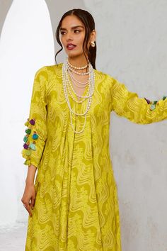 Lemon green asymmetric tunic with floral fantasy print and tassel embellishments. Comes with pant. - Aza Fashions Fantasy Tunic, Tunic With Pants, Asymmetric Tunic, Green Tunic, Pant For Women, Tunic Pattern, Print Tunic, Aza Fashion, Fashion Set