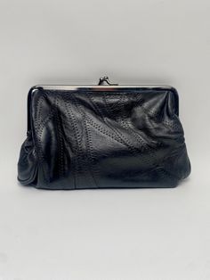 Vintage black woman's Purse / make-up Bag / Wallet with stitches was made in Italy in '80s. Perfect vintage condition! No damage or tears, ready to use. Vintage addition. Material: ・faux leather, metal Colour: ・black, silver Dimensions: Height: 15 cm / 5.90 inches Width: 23 cm / 9.05 inches Worldwide delivery! Everything is carefully wrapped and packed. If you have any further questions, please let me know. Love, Katra Black Leather Evening Pouch, Black Soft Leather Clutch For Evening, Vintage Black Pouch Shoulder Bag, Retro Black Clutch Shoulder Bag, Black Shoulder Bag With Coin Pocket For Daily Use, Black Coin Purse With Coin Pocket For Formal Occasions, Formal Black Leather Coin Purse, Formal Black Soft Leather Clutch, Vintage Black Pouch Evening Bag