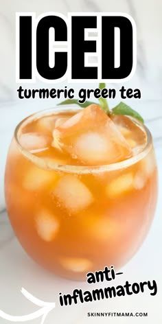 an iced drink in a glass with mint on the rim and text overlay reads,'iced tumericic green tea anti - imfamatory '