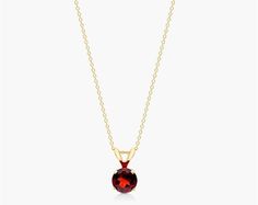 14K Yellow Gold Garnet Birthstone Necklace. The birthstone of January, Garnets are known for their captivating deep color. Garnets are said to bring love, luck, health, protection and friendship to those who wear it. This garnet pendant is the perfect piece for your special someone. Formal Birthstone Pendant Necklace, Classic Birthstone Pendant Necklace, Garnet Birthstone Necklaces In Fine Jewelry Style, Garnet Birthstone Necklace In Fine Jewelry Style, Classic Garnet Necklace For Anniversary, Fine Jewelry Garnet Necklace As Gift, Yellow Gold Garnet Jewelry With Birthstone, Garnet Round Necklace In Fine Jewelry Style, Garnet Birthstone Fine Jewelry Necklace