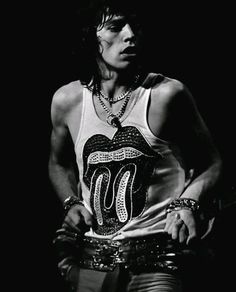 the rolling stones guitarist and singer mick smith in his band's concert shirt, circa 1970