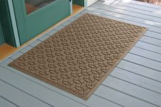 a door mat on the outside of a house