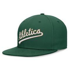 Top off any fan look with this Oakland Athletics Evergreen True hat. Crafted by Nike, it features bold graphics across the front and a fitted design for all-day comfort. The Dri-FIT fabric wicks away moisture, perfect for when the on-field Oakland Athletics action heats up. Wipe clean with a damp cloth Flat bill with ability to curve Structured fit High Crown Officially licensed Dri-FIT technology wicks away moisture Fitted Brand: Nike Material: 100% Polyester Imported Embroidered graphics Six p Green Sporty Snapback Cap, Sporty Green Baseball Cap For Sports, Green Sporty Snapback Hat For Streetwear, Green Flat Bill Hat For Streetwear, Green Sports Baseball Cap, Green Cap For Game Day, Green Casual Baseball Cap For Sports, Green Flat Bill Sports Hat, Green Six-panel Trucker Hat For Sports