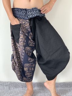 "These special design harem pants have fisherman pants style wrap around waist and belt, totally unlike anything before them. The main fabric is made from pre-washed soft cotton with subtle texture. The fold over waist is made from vintage handmade fabric brought from hill tribes in northern Thailand, so they are totally unique. There is one side pocket for your essentials. The hem has matching pull-up tabs for added personality. These performance pants are design for extreme mobility, perfect f Traditional Wide Leg Harem Pants For Meditation, Traditional Harem Pants With Pockets, Summer Full-length Hippie Harem Pants, Bohemian Non-stretch Harem Pants, Fitted Bohemian Full-length Harem Pants, Palazzo Pants Plus Size, Ninja Pants, Men’s Harem Pants, Unique Pants