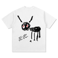 a white t - shirt with black and red eyes