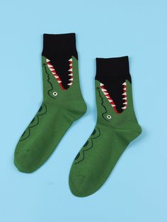 Color: Multicolor Composition: 100% Polyester Material: Fabric Pattern Type: Cartoon Type: Crew Socks Product Measurements in cm : Size Height Length Width one-size 20 19 8 Crocodile Alligator Crew Socks Funny Socks for Men Novelty Socks Funky Socks Here we have our vibrant and playful line of Socks, where fun and fashion collide! These socks are designed to add a touch of joy and individuality to your wardrobe. With a wide range of unique patterns, bold colors, and quirky designs, our Socks are the perfect accessory to showcase your personality and make a statement. Key Features: Comfortable Fit: We understand the importance of comfort, which is why our socks are made with soft, breathable materials that provide a cozy and snug fit. They feature a blend of high-quality fabrics that keep y Cool Socks For Men, Funny Socks For Men, Mens Novelty Socks, Men Cartoon, Trendy Socks, Funky Socks, Sock Animals, Funny Socks, Novelty Socks