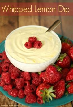 whipped lemon dip with strawberries on a plate