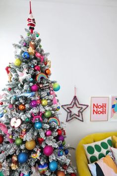 a brightly colored christmas tree in a living room