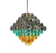 a multicolored chandelier hanging from a chain on an isolated white background