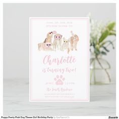 a card with dogs on it and the words charlotte is turning two in pink ink