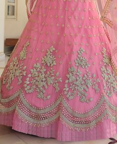 COLOR : Shimmering Blush Pink FABRIC : Top (Blouse) - Soft Net, Bottom (Lehenga) - Soft Net, Dupatta - Soft Net WORK : Heavy Metallic Thread Embroidery, Zari Work, Cutwork, Sequins, Motifs, Lace Border OCCASION : Wedding, Reception, Sangeet, Engagement READY-TO-WEAR : NoSTITCHING : Available as semi-stitched fabric, can be stitched using standard size option (+$30). Note: There might be a slight color variation due to lighting and flash used during photoshoot. The bright shade seen is the best c Blush Pink Fabric, Holiday Promotions, Cutwork Embroidery, Embroidered Wedding, Wedding Lehenga, Zari Work, Net Dupatta, Thread Embroidery, Lace Border