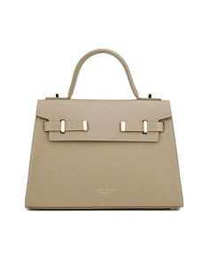 a beige leather handbag with two handles on the front and one handle at the top