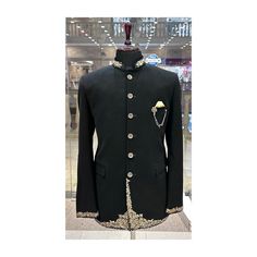 "Make an edgy statement with our BLACK lion  EMBROIDERED INDO WESTERN designed thoughtfully for the modern Indian man. A fusion staple fit for every occasion, adds the right amount of cultural twist to the western silhouette. Color: Black  Garment Type: Indo Western Neck: Mandarin Collar Fabric: Micro Velvet Embroidery: Zari work with sequin embroidery The Product Price is inclusive of: 1 Indo-Western and 1 Trouser Style Bottom Model is 6'2\" wearing Size 38 Product color may slightly vary due to photographic lighting sources or your screen settings. ~We provide fully stitched outfits as per your measurements ~Outfits can be customised in any colours For customisation please contact  ~We provide worldwide shipping ~You choose we design. ~High quality dresses no replicas only hand embroider Men Jodhpuri, Jodhpuri Sherwani, Western Silhouette, Indian Jackets, Jodhpuri Suit, Embroidered Sherwani, Velvet Embroidery, Sherwani For Men, Wedding Sherwani