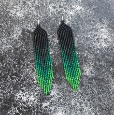 Emerald green & pink seed bead earrings Chandelier earrings | Etsy Green Fringe Jewelry For Festivals, Green Fringe Jewelry For Festival, Bohemian Green Beaded Fringe Earrings, Unique Fringed Dangle Beaded Earrings, Unique Fringe Dangle Beaded Earrings, Bohemian Green Beaded Fringe Chandelier Earrings, Green Beaded Earrings With Beaded Fringe, Green Beaded Fringe Earrings For Festival, Green Beaded Tassel Earrings For Festivals